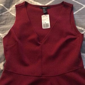 Peplum style sleevless top